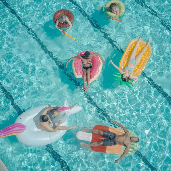 people in a pool people in a pool