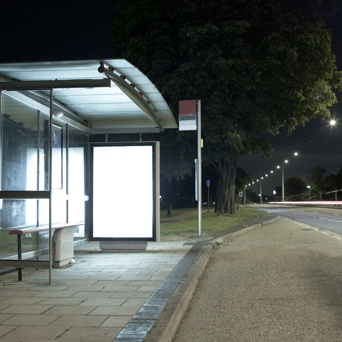 Lit up buss stop at night