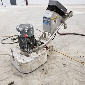 machine on concrete for coating