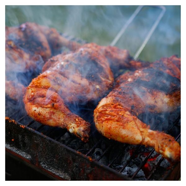 jerk chicken on a grill