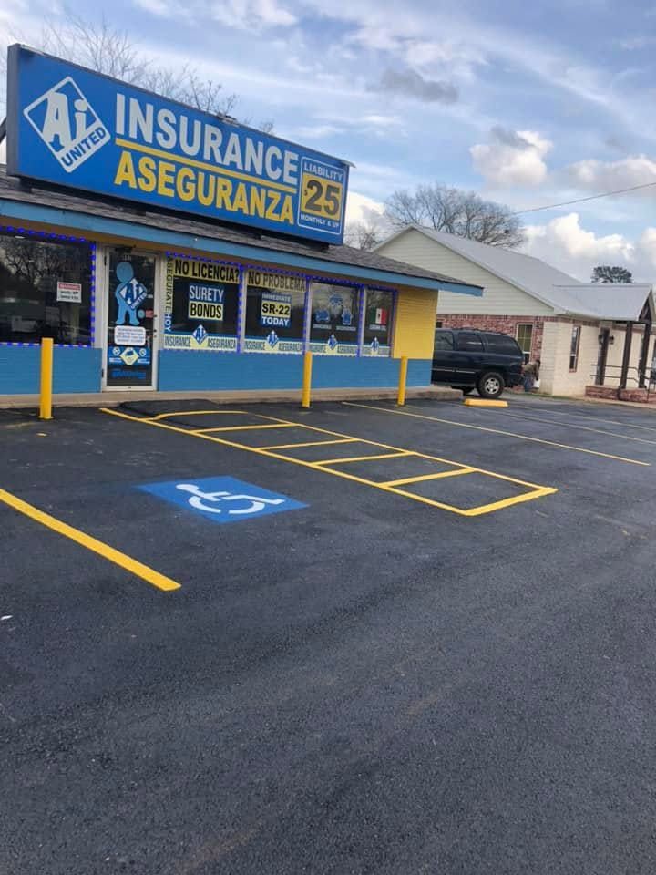Fresh paved parking lot outside business Paving 3