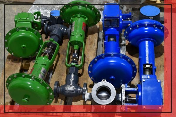 image of multiple control valves, some green colored and some blue