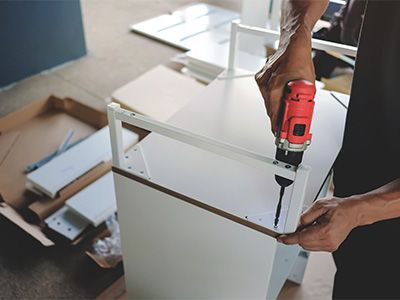 Person assembling furniture