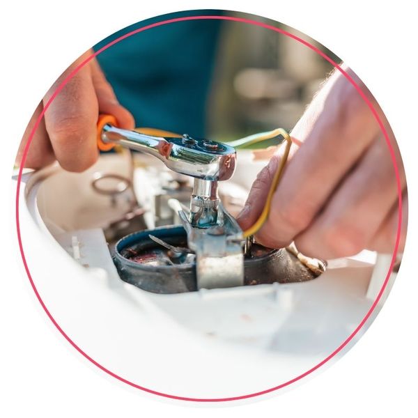 Person repairing a water heater