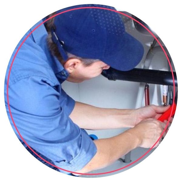 Plumber repairing pipes