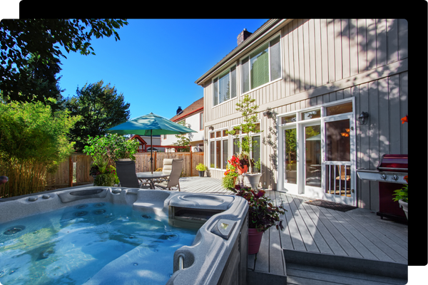 backyard hot tub next to house