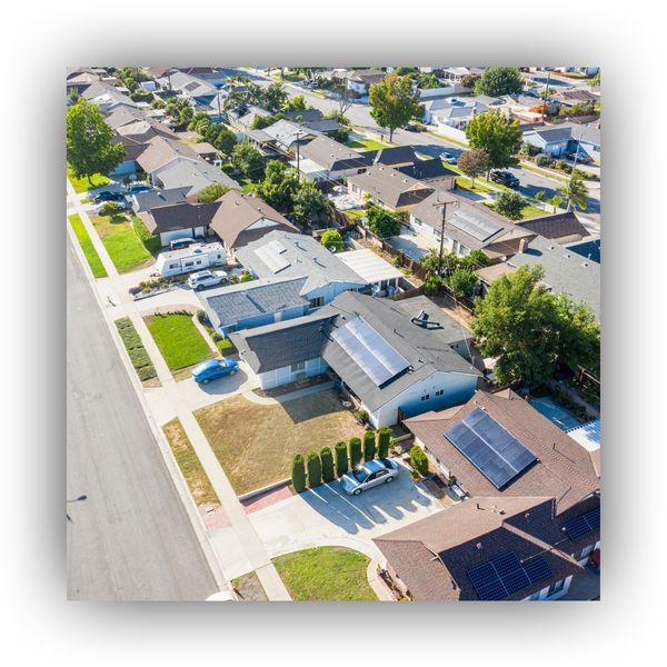 neighborhood with solar panel installations