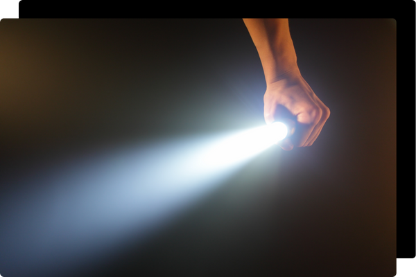 person using a flashlight in a power outage