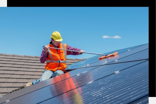 solar panel being cleaned solar panel being cleaned