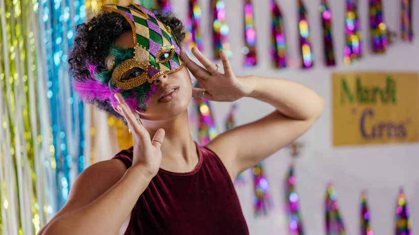 woman dressing for Mardi Gras