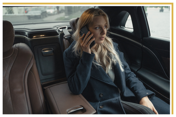 Executive in a car. Executive in a car.