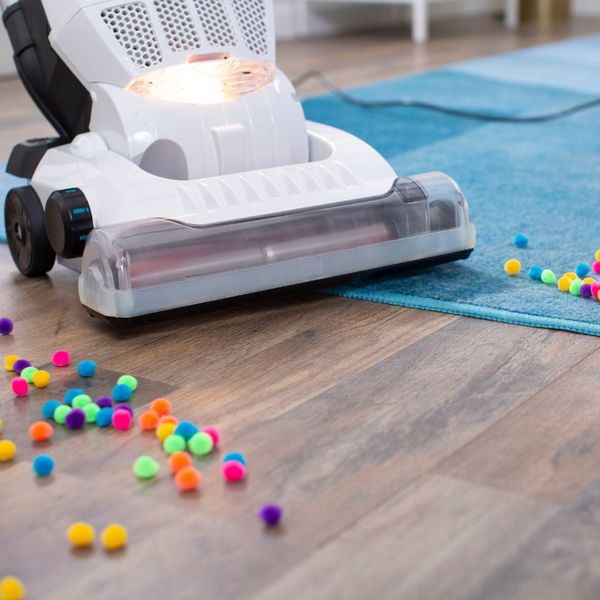 Simplicity vacuum cleaning up felt balls