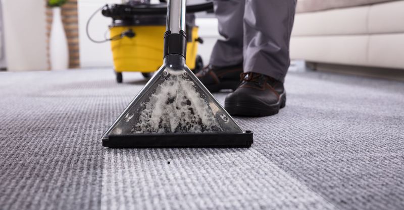 Vacuuming a carpet