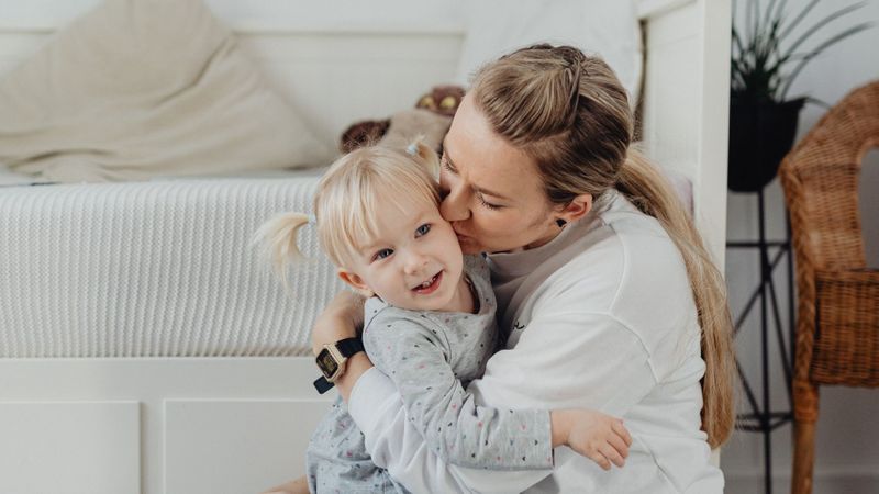 mom kissing toddler mom kissing toddler