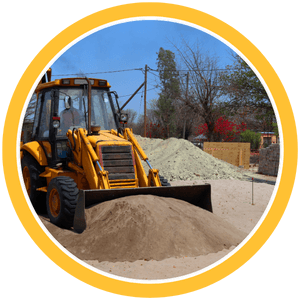 heavy equipment pushing sand