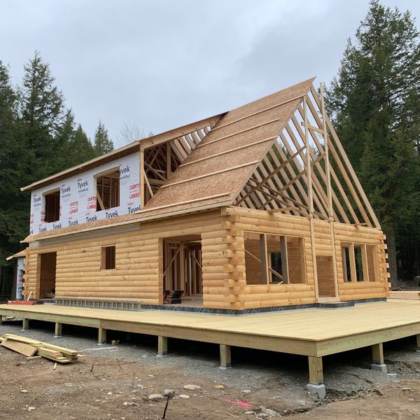 new custom log cabin being built