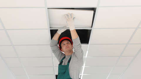 ceiling contractor installing tile ceiling contractor installing tile