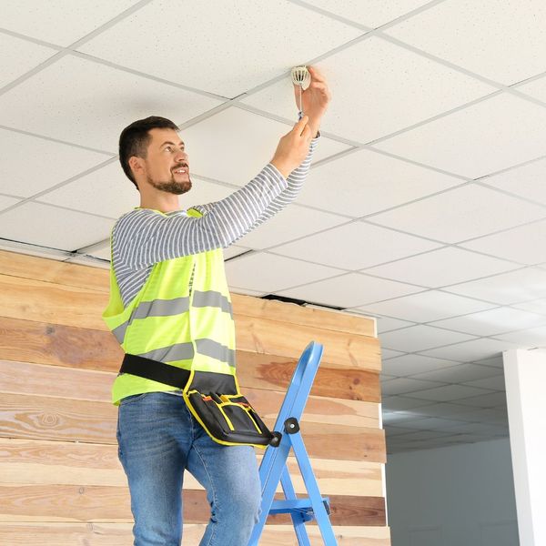 finishing touches of acoustic ceiling installed