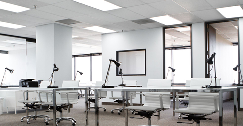 Open office space with acoustic ceiling tiles Open office space with acoustic ceiling tiles