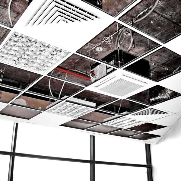 ceiling with exposed wiring