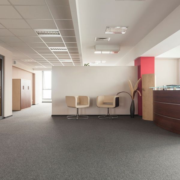 Office reception area with acoustic ceiling tiles