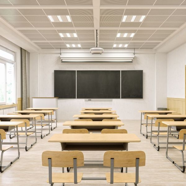 a classroom with a suspended ceiling