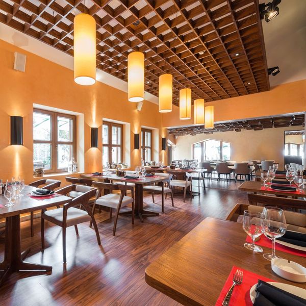 a restaurant with an acoustical ceiling