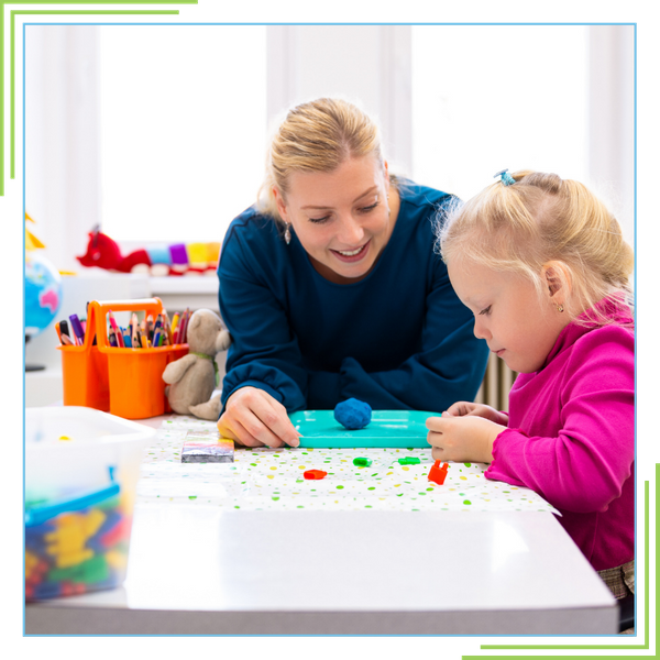 Teacher and child in school.