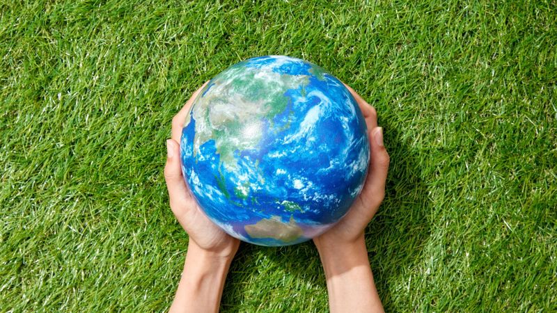 holding the world in hands