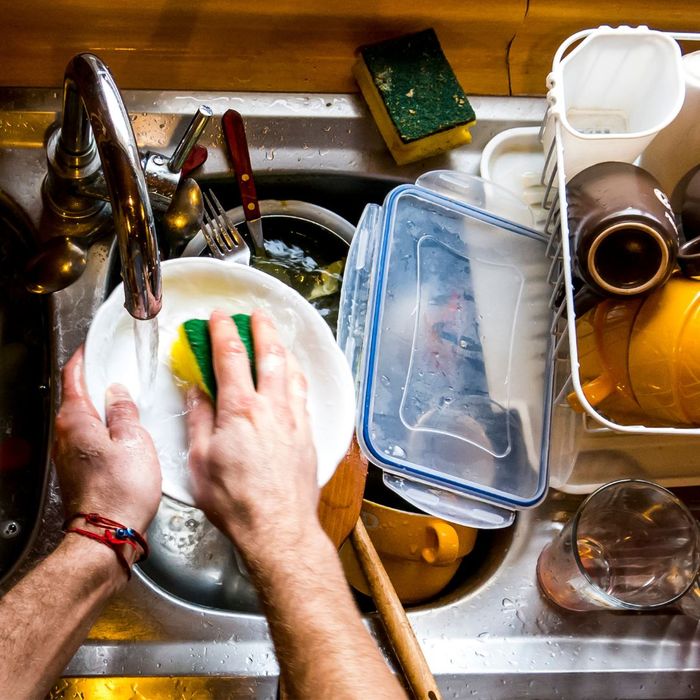 washing dishes in a sink