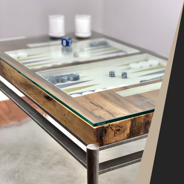 A white and dark wood colored Backgammon table