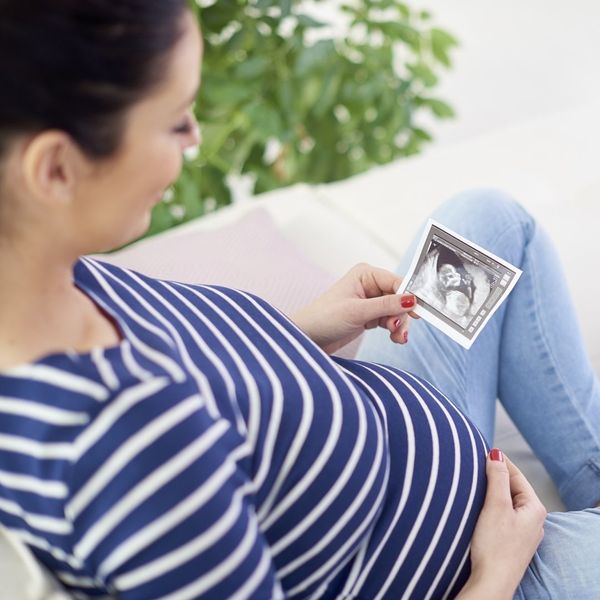 A pregnant woman at home. A pregnant woman at home.