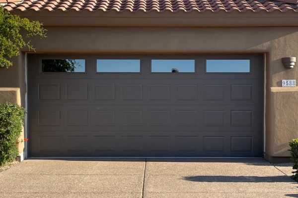 new garage door with accent windows Arizona Garage Door Services 1.jpg