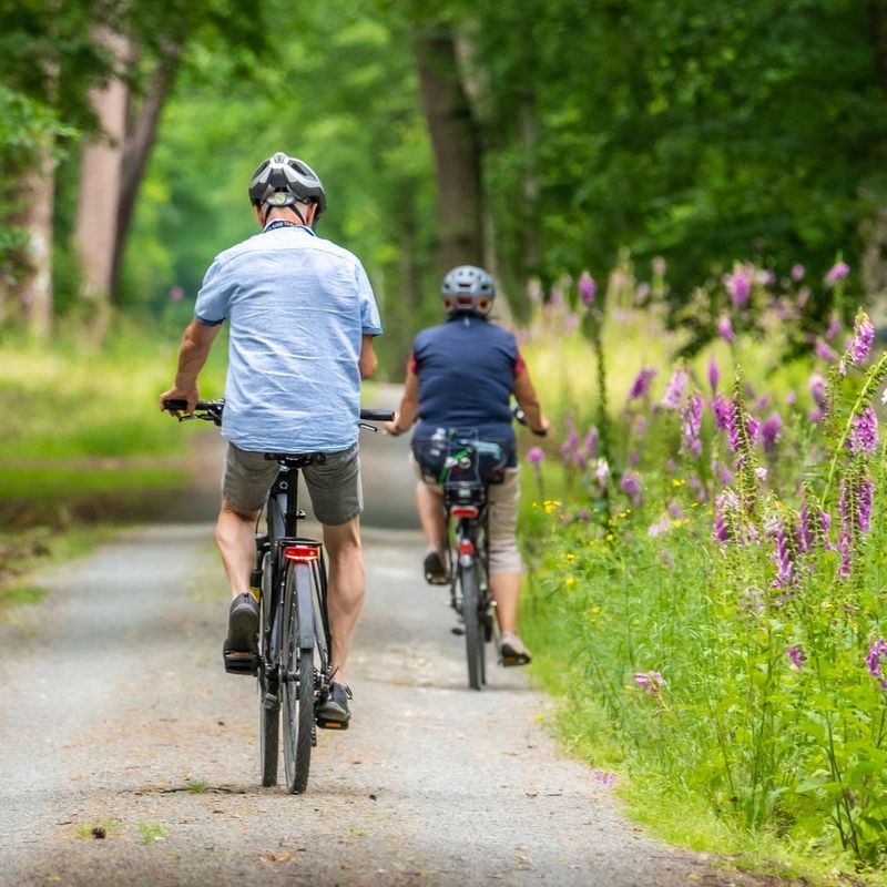 two people biking