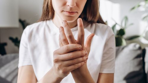 woman with RA in her hands