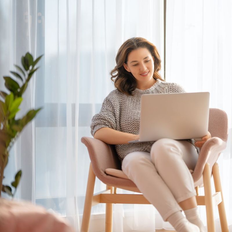 a woman using her laptop