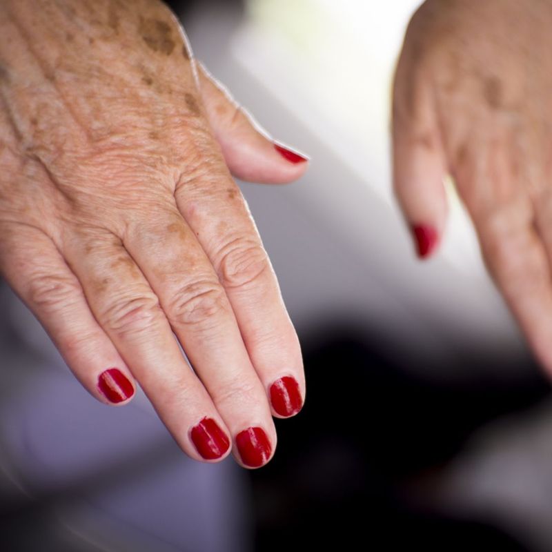 woman holding out her hands