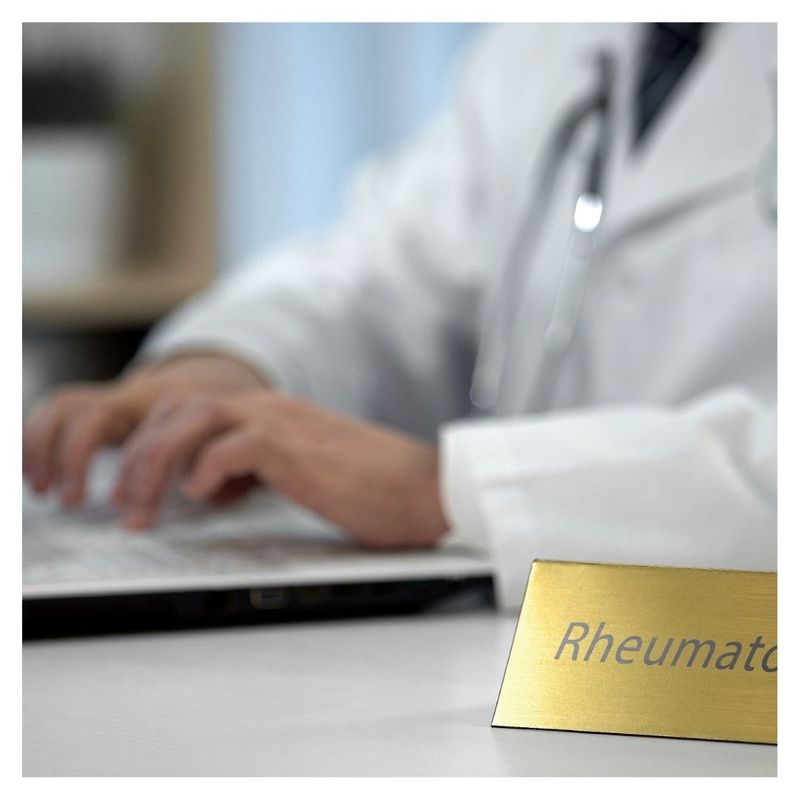 rheumatologist on computer