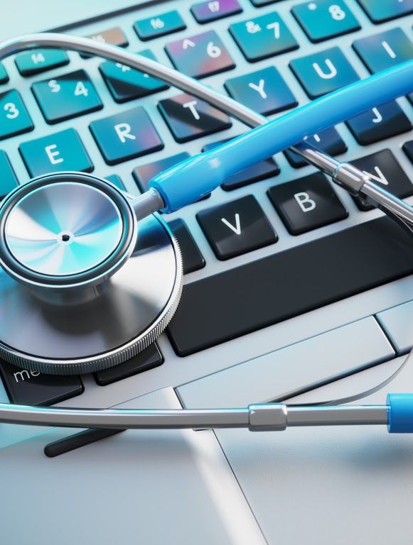 image of a stethoscope on laptop