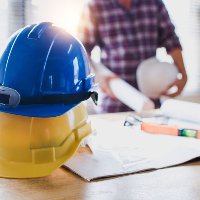 construction hats on table