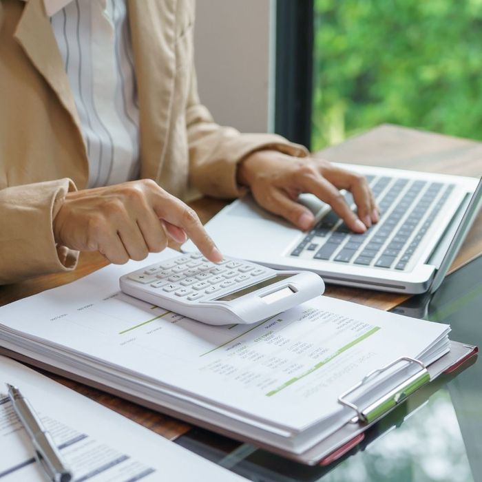 woman using a calculator