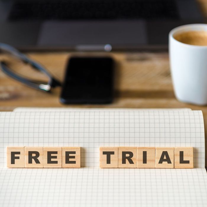 the word free trial in front of a computer