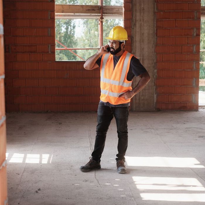 construction worker on the phone construction worker on the phone