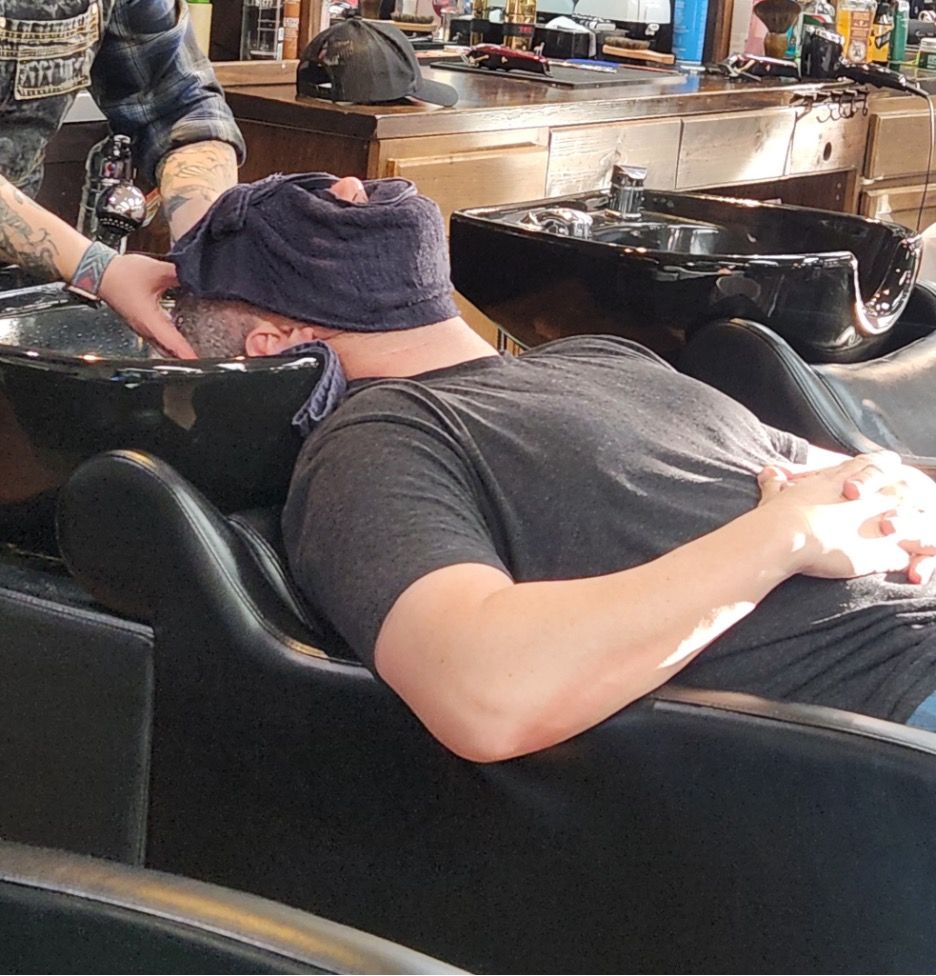 barber-performing-haircut-treasure-valley