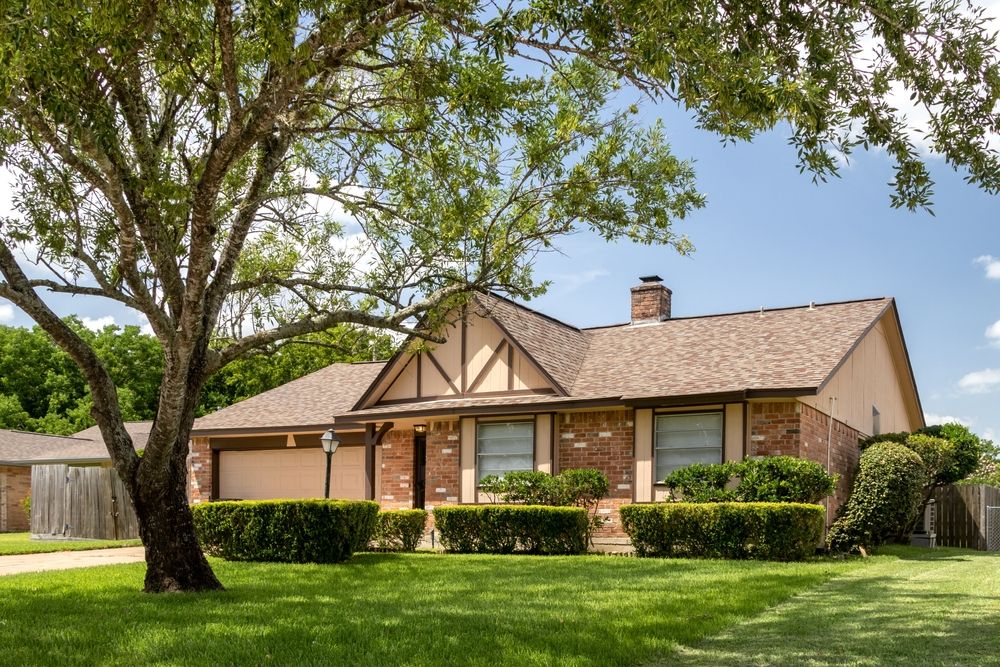 exterior of home with tree in front