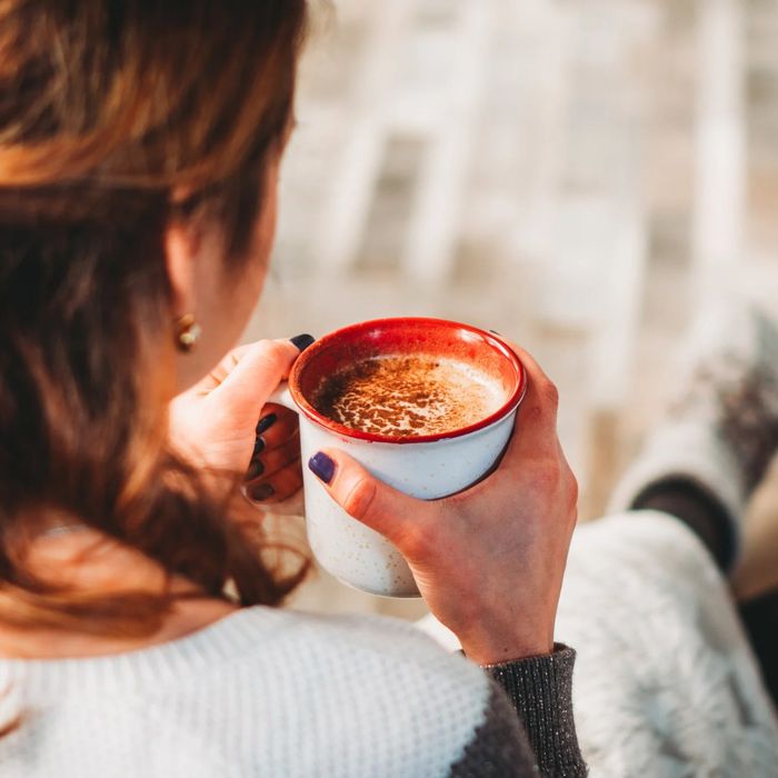 woman holding coffee