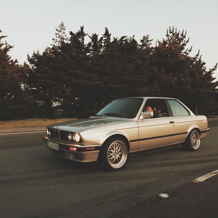 bmw driving on the road