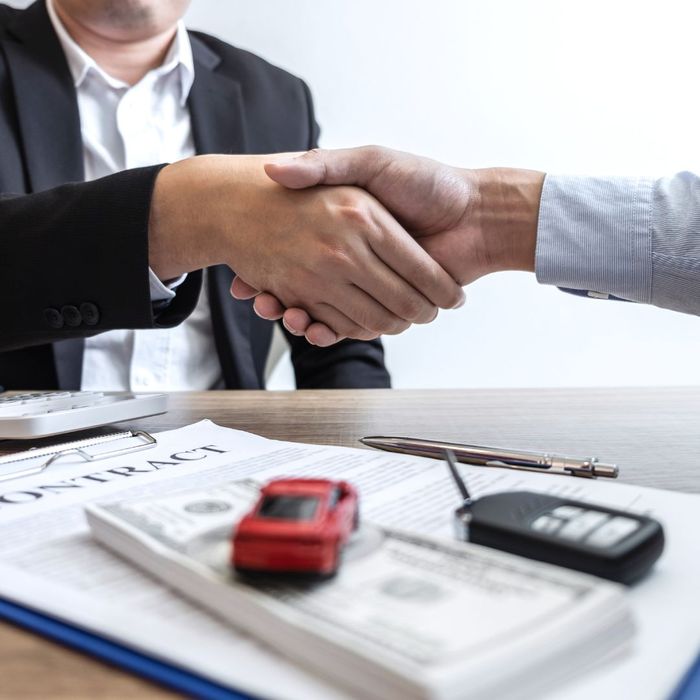 handshake after purchasing a car