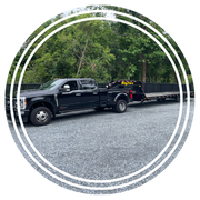 Parked black truck carrying a flatbed