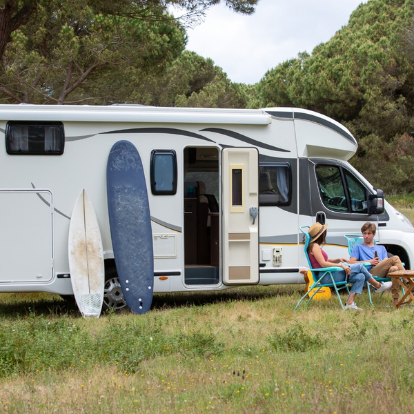Couple outside of RV Couple outside of RV
